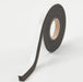 Roll of black expanding foam tape on a white background