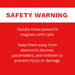 Safety warning label on a red background with text about handling powerful magnets.
