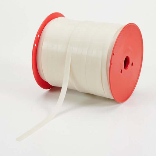 A roll of white silicone edge premium tape used for fabricating tension fabric displays, with a red core visible.